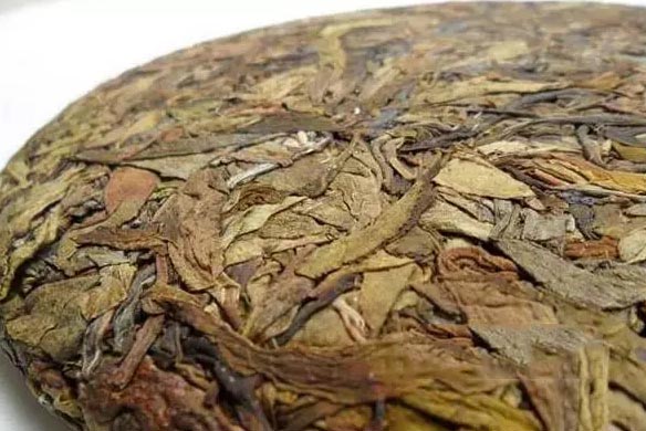 Huang pian (golden leaves) puerh tea cake